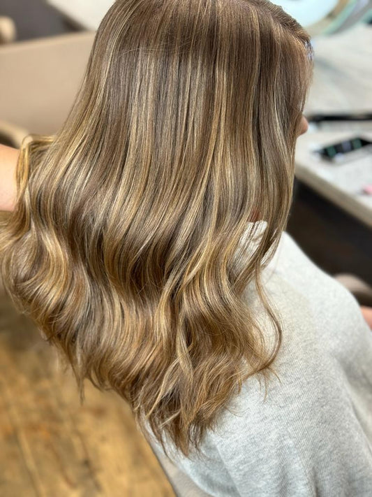 Blonde balayage with sun-kissed highlights